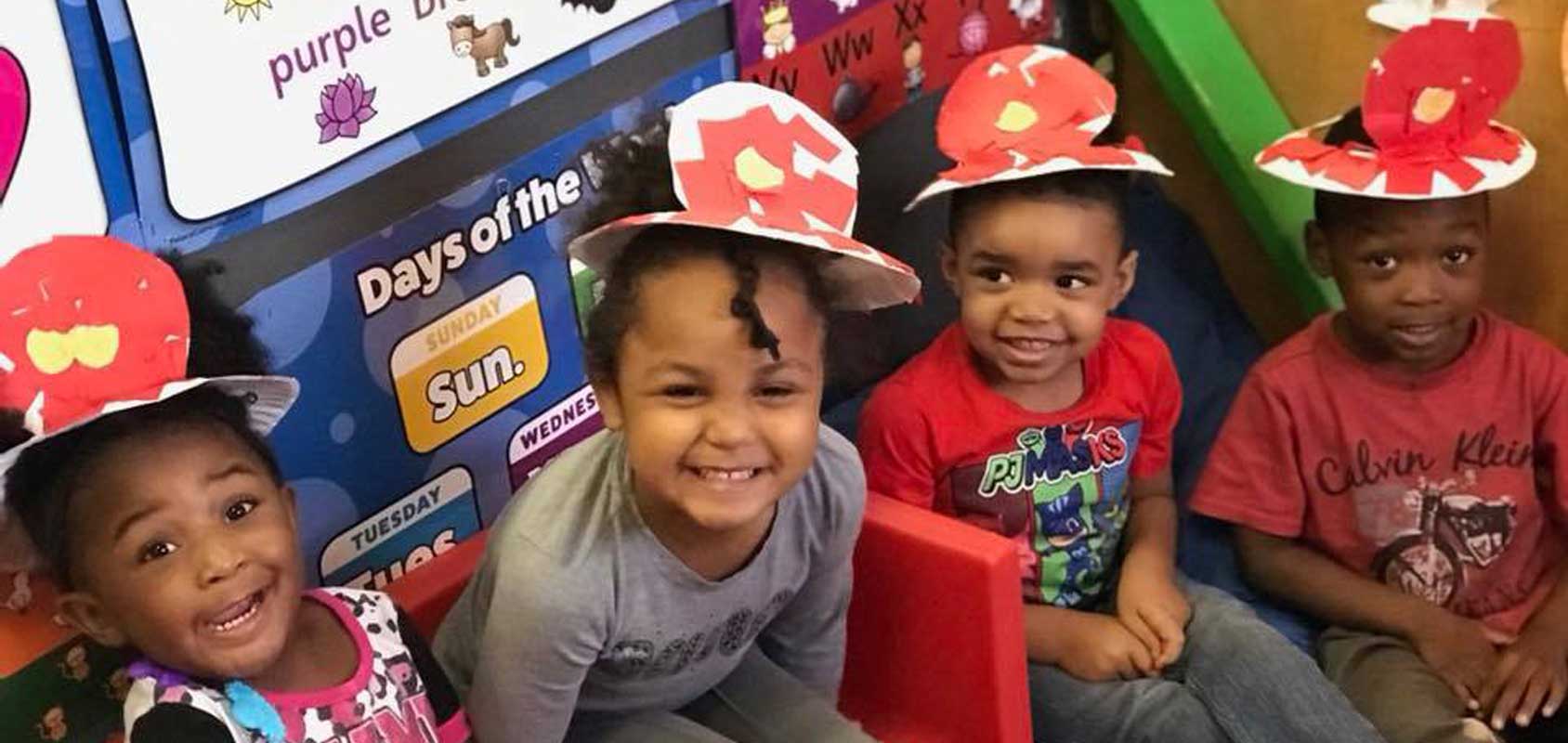 Kids wearing fire hats